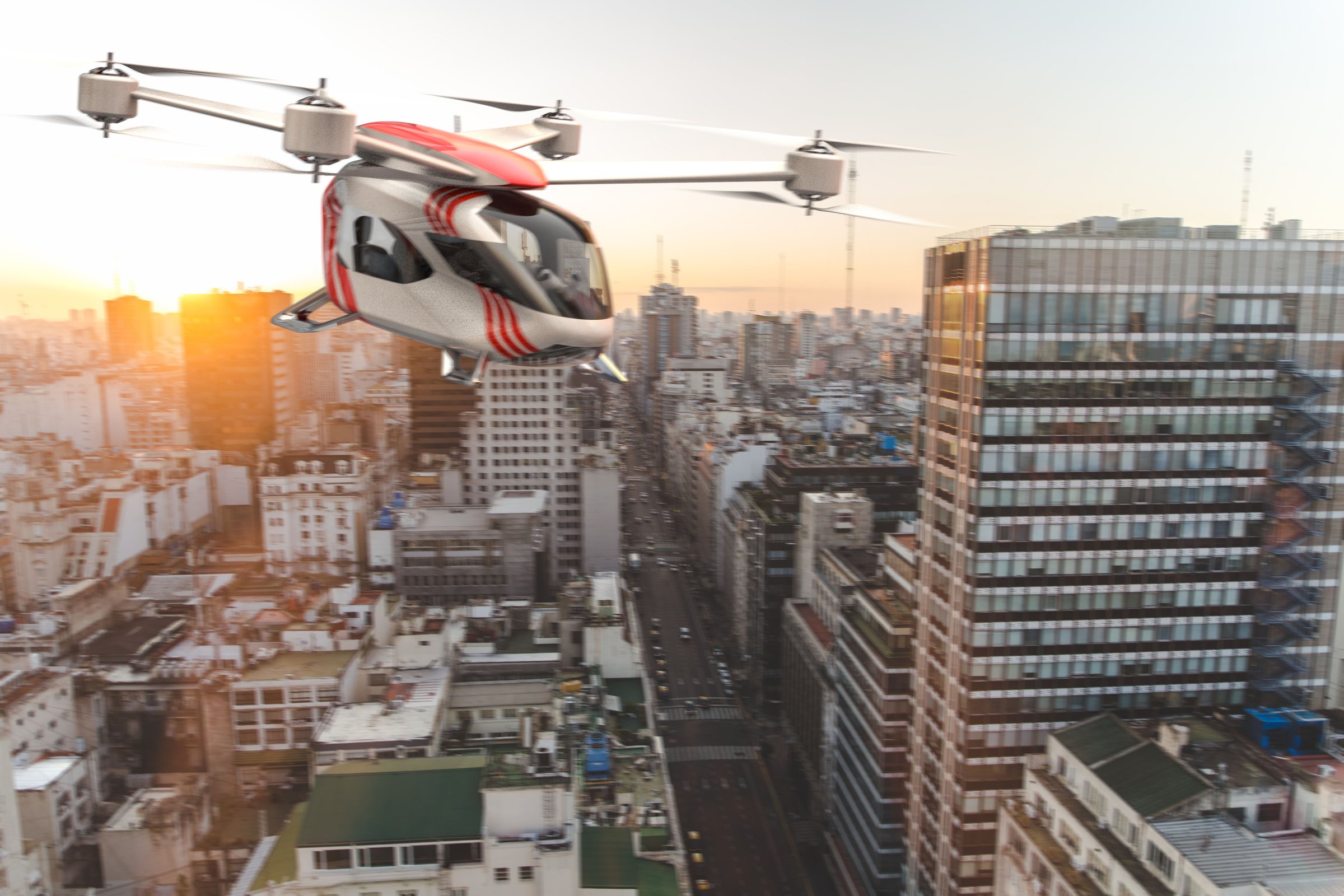 Ambular 3.0 over a city at dusk