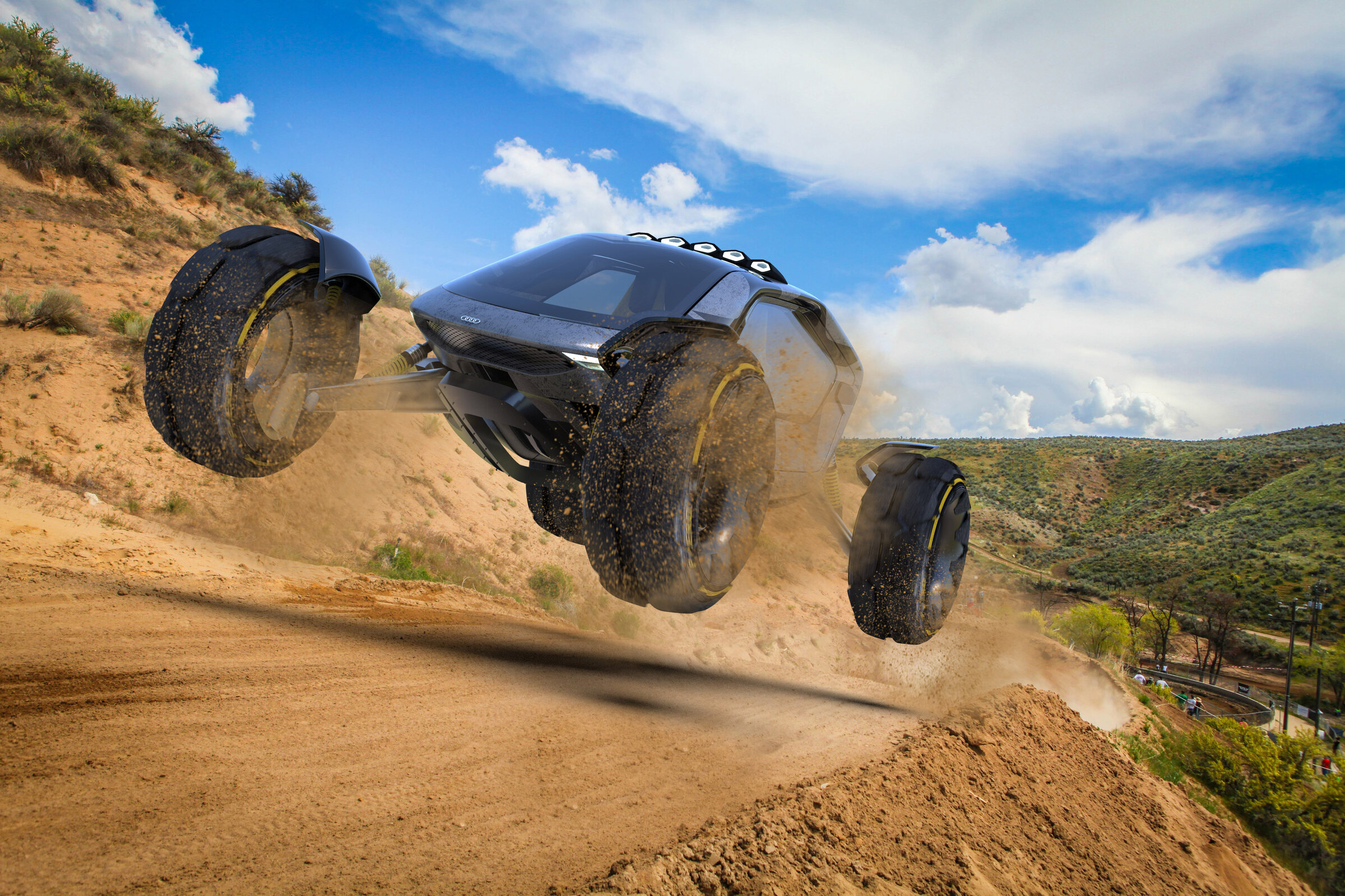 Audi Geo airborne over a desert hillcrest