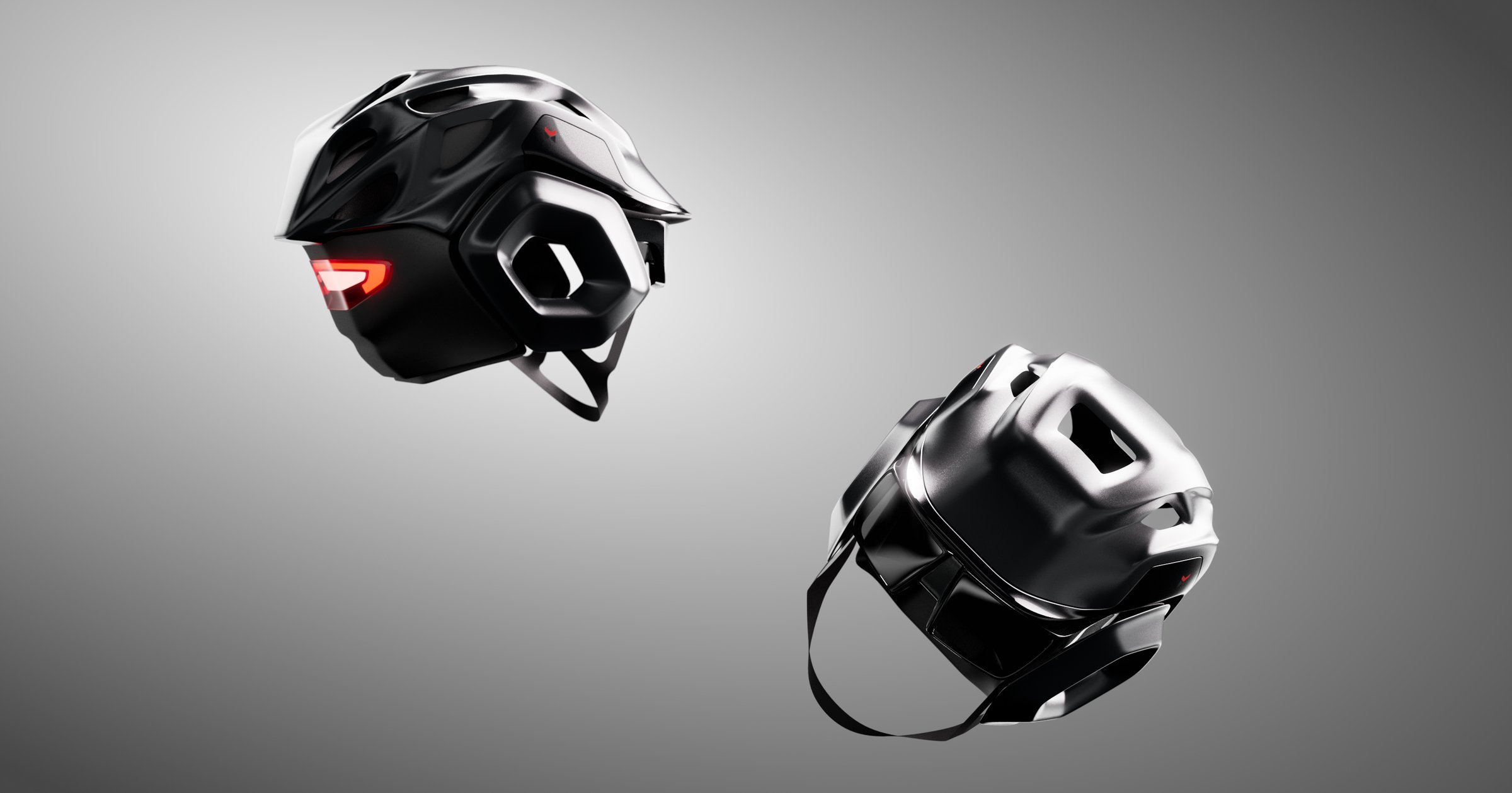 Two Coraza helmets floating in studio light showing shell and strap architecture