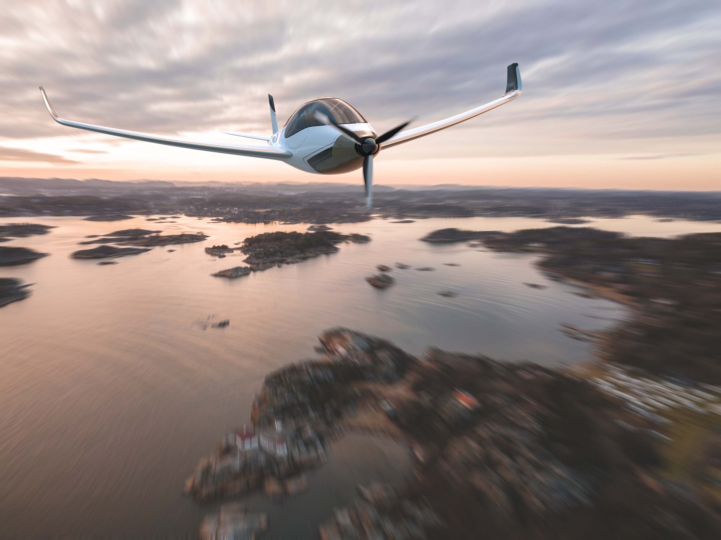eAir flying over a fjord archipelago at dusk