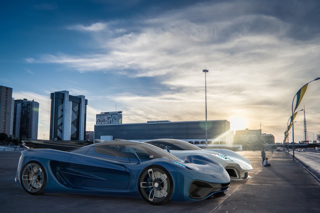 Two Koenigsegg concept cars at sunset in a city plaza