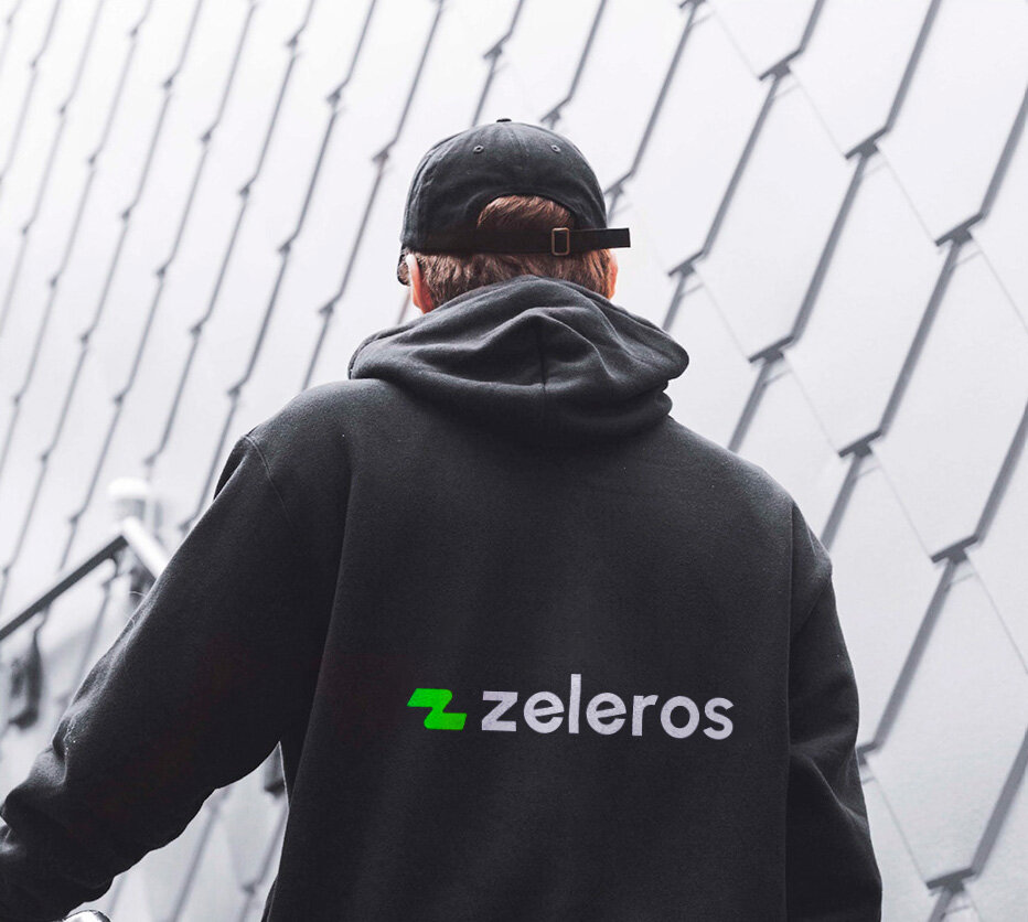 Black Zeleros hoodie with green logo on the back