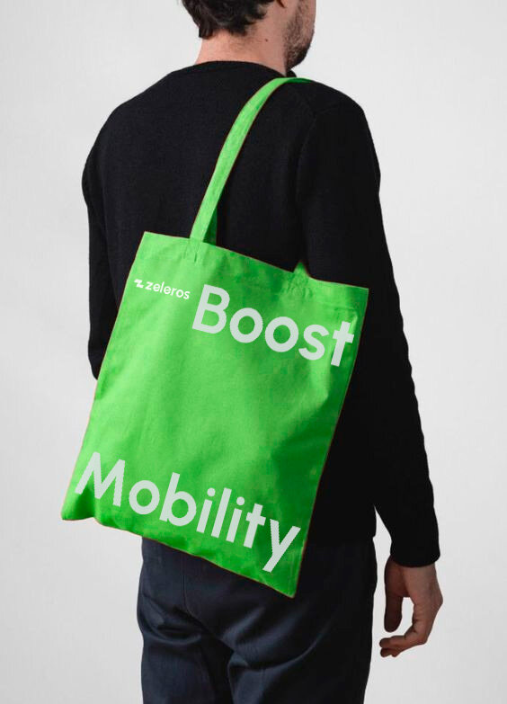 Zeleros green tote bag with dark Boost Mobility print